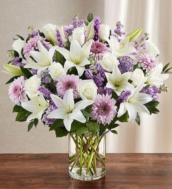 Lilies and Chrysanthemum in Glass Vase