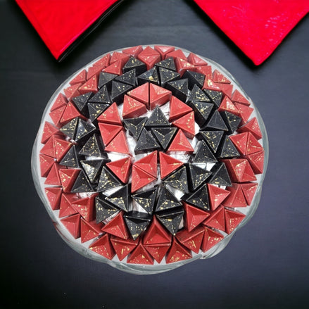 Triangular Red and Black Artisan Chocolates